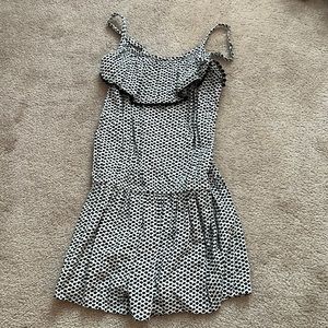 Super cute girls black and white ruffle romper.